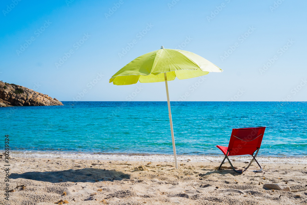 Beach umbrella and lounge chair