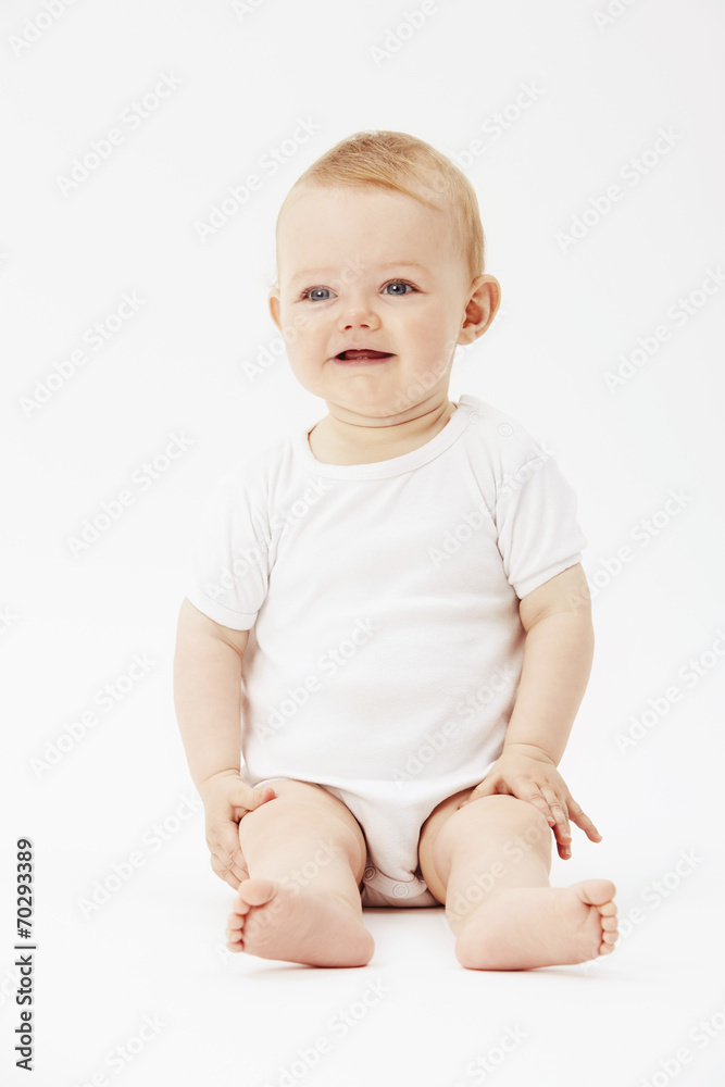 Young baby girl looking away, studio. Young baby girl looking away, studio.