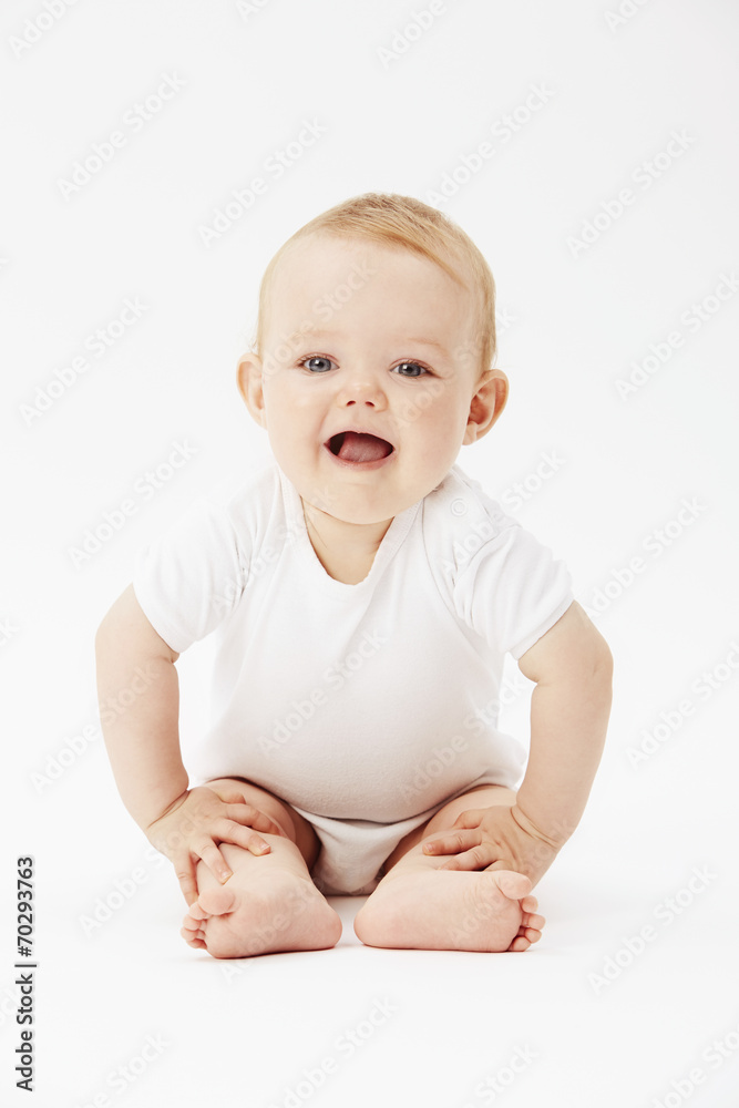 Young baby girl looking at camera, studio. Young baby girl looking at camera, studio.