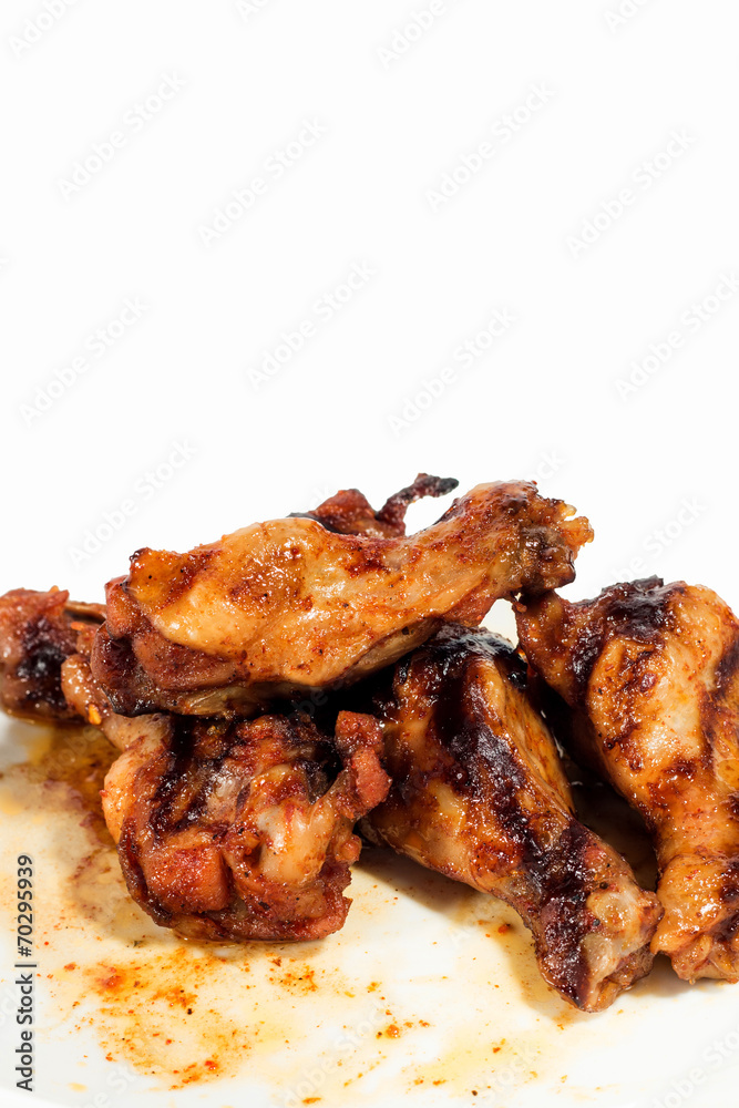 Grilled chicken wings isolated on white background Grilled chicken wings isolated on white background