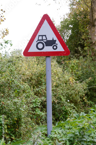 Tractor ahead sign and signpost