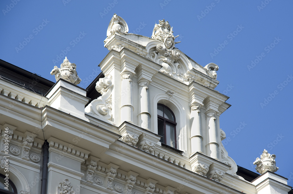 Latvia, Riga. Superstructure on a house roof in the form of juge