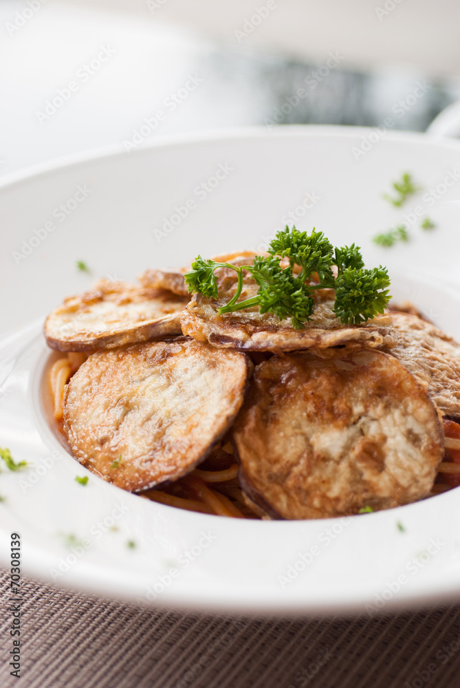 Spaghetti with a slice of grilled eggplant Spaghetti with a slice of grilled eggplant