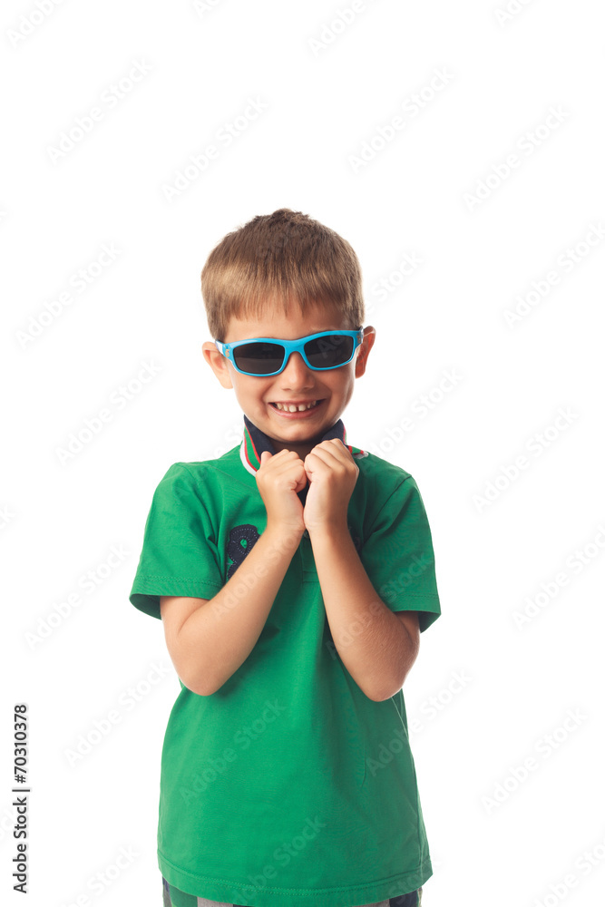 Little smiling boy with sunglasses isolated on white