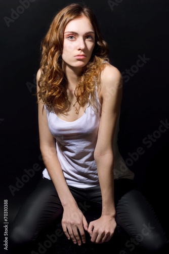 Beautiful girl with long brown hair in casual clothes © Dmitriy Raykin