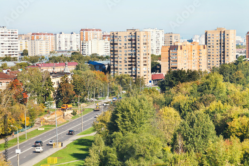 view of urban street in sunny autumn day