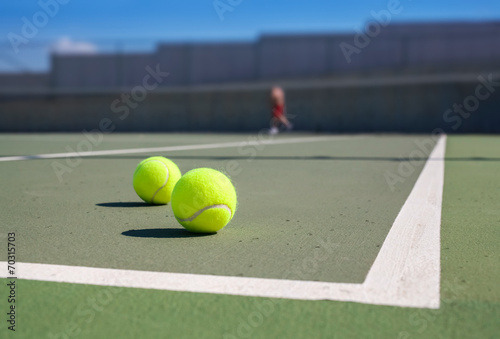 two tennis ball near baseline © Myst