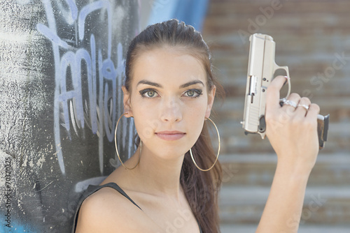 Canvas Print beautiful sexy girl holding gun
