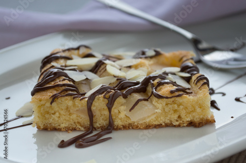 Apple sponge cake with chocolate and almonds