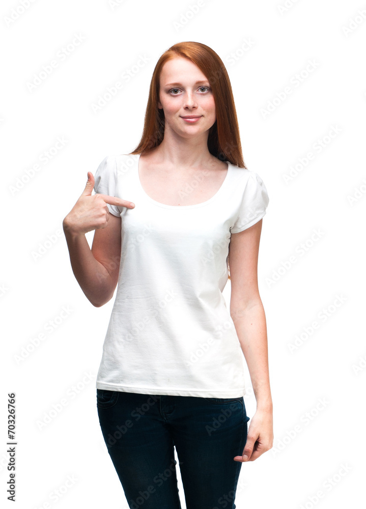 Red-haired girl showing thumbs up. Isolated on white background Red-haired girl showing thumbs up. Isolated on white background