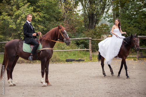 wedding couple on horses