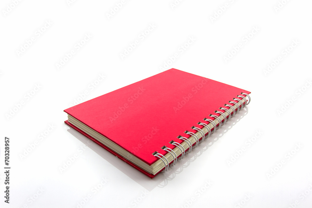 Red diary book on white background. Red diary book on white background.