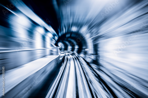 Abstract train moving in tunnel