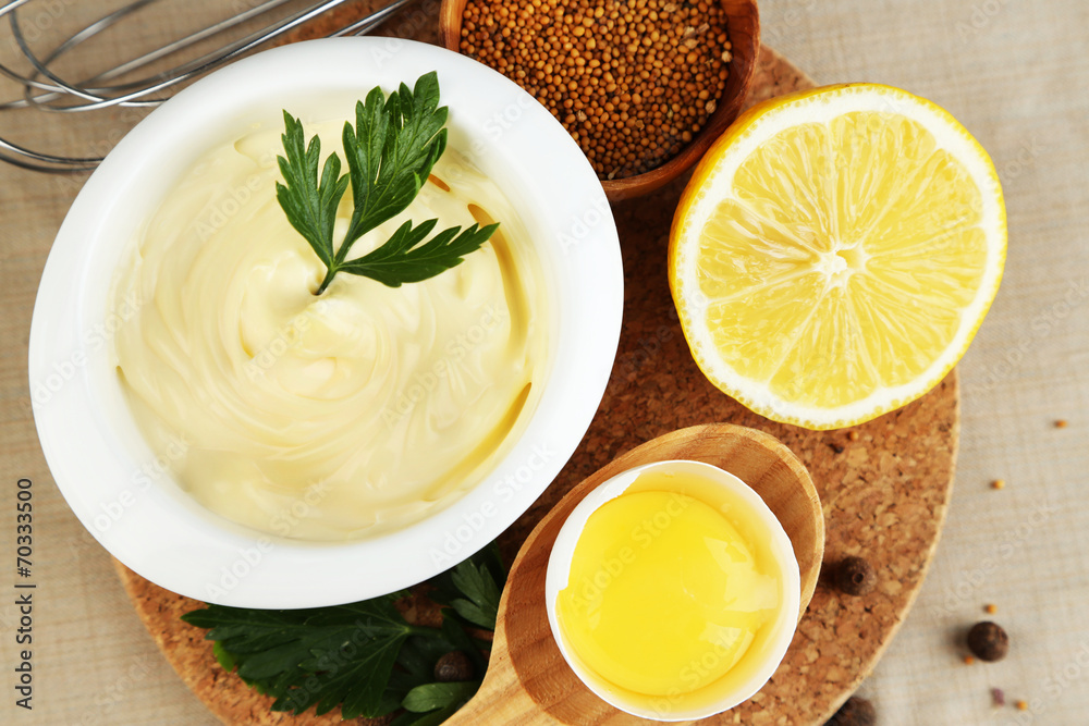 Mayonnaise ingredients on wooden background Mayonnaise ingredients on wooden background