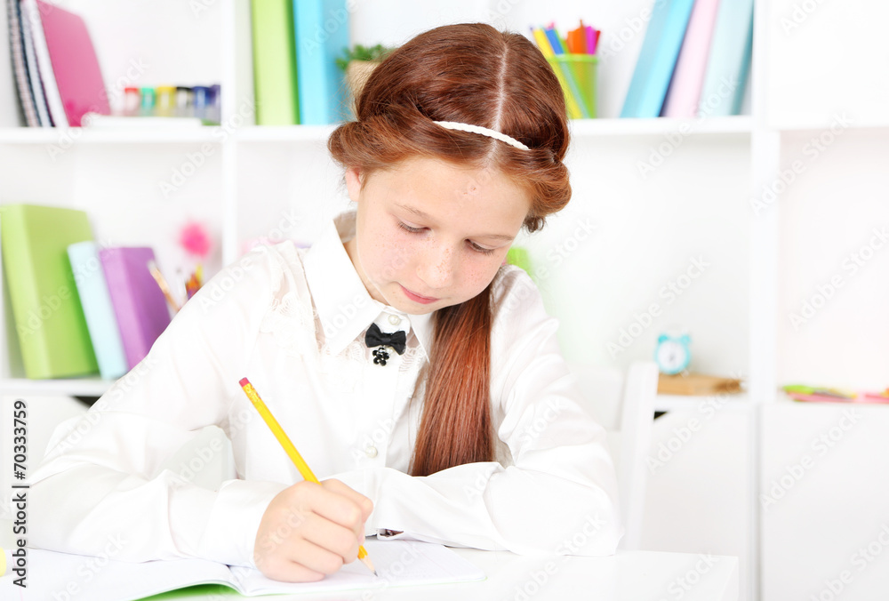 Cute girl at workplace in classroom Cute girl at workplace in classroom