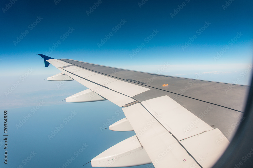 Airplane wing out of window