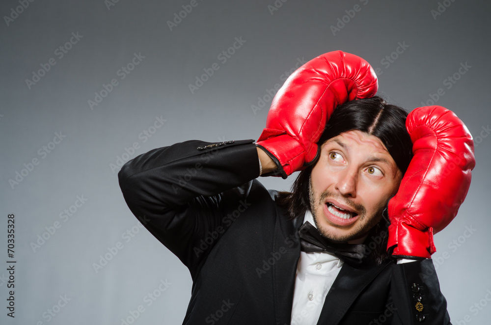 Man businessman with boxing gloves Man businessman with boxing gloves