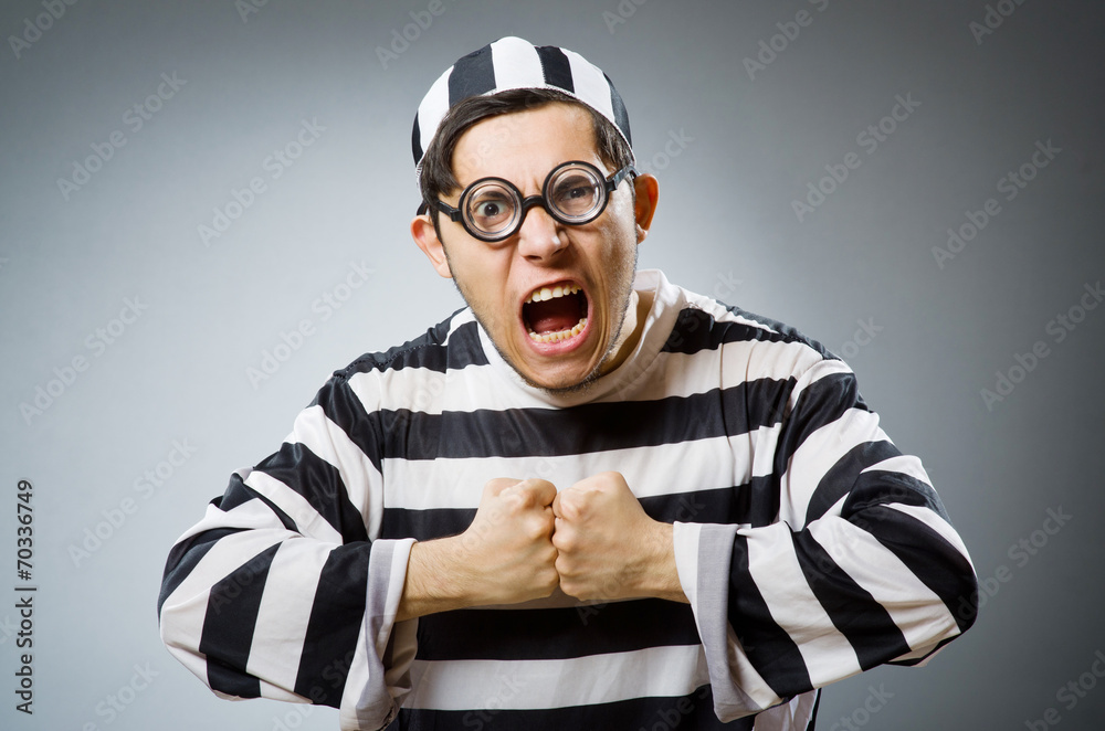 Funny prison inmate in concept Funny prison inmate in concept