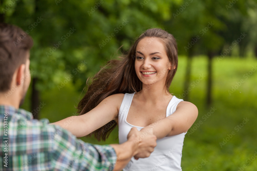Photo of attractive couple holding by hands. Photo of attractive couple holding by hands.
