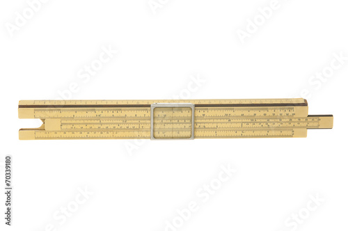 Antique slide rule on white background photo