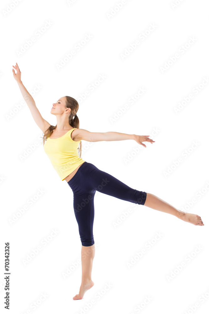 Beautiful sporty woman jumping isolated on white background