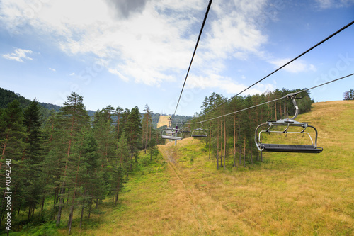 Empty skylift on the mountain during the summer