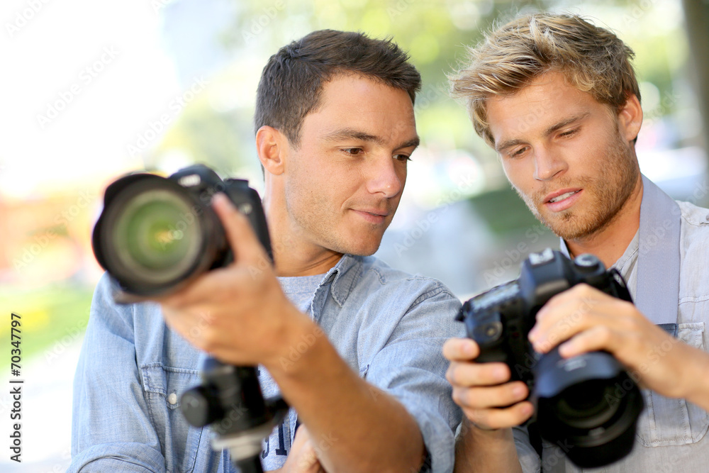 Young men on a photography training day Young men on a photography training day