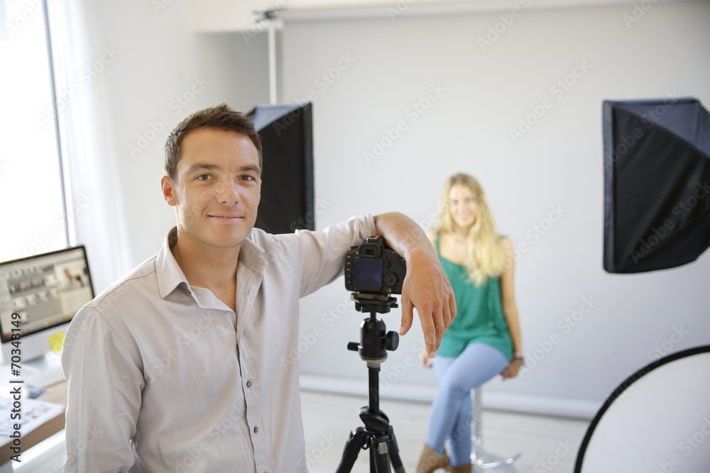 Fashion photographer at work in studio Fashion photographer at work in studio