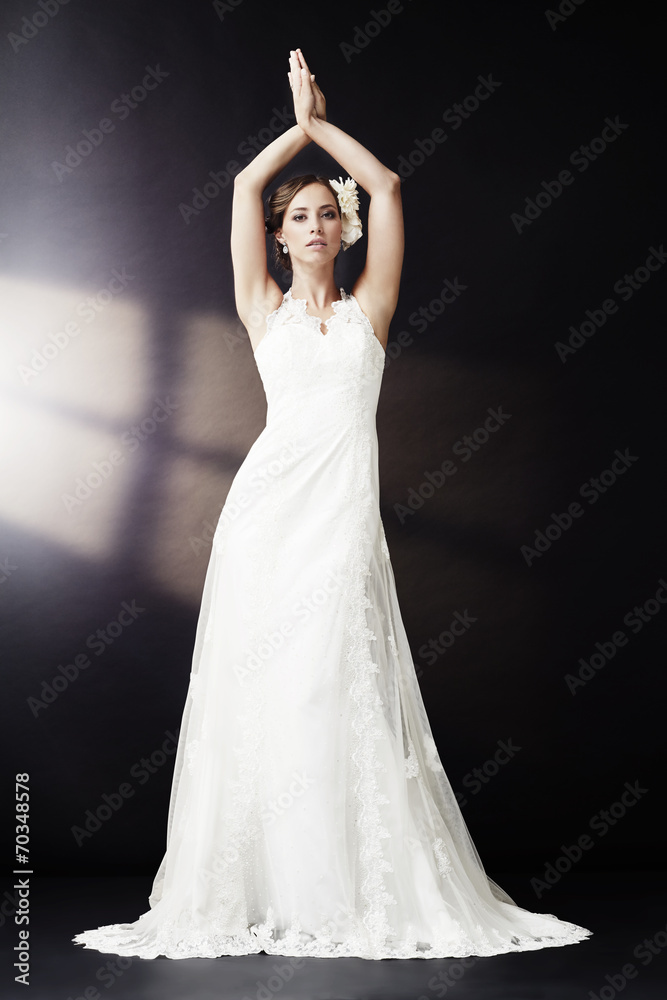 Fototapeta premium Elegant bride in wedding dress posing, portrait.