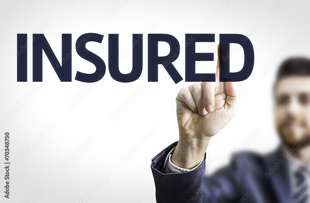 Business man pointing to transparent board with text: Insured Business man pointing to transparent board with text: Insured