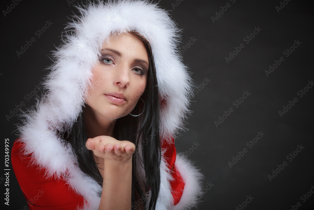 Portrait woman wearing santa clause costume on black Portrait woman wearing santa clause costume on black