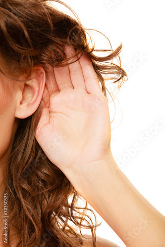 Canvas Print Part of head woman with hand to ear listening