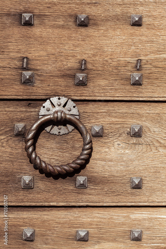 Old wooden background with metal rivets