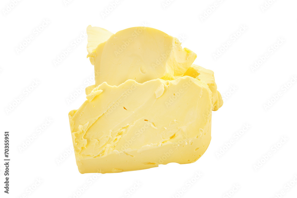 yellow butter from milk on white background