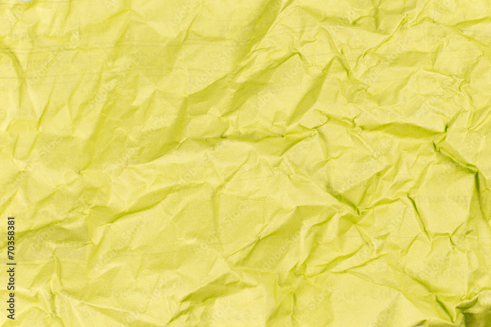 yellow crumpled paper texture background.