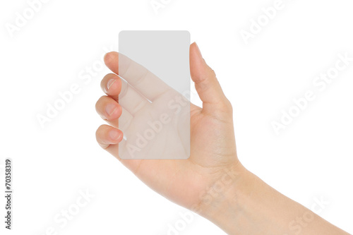 Hand holds transparent card on white background .