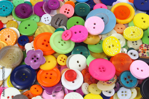 Many coloured sewing buttons photo