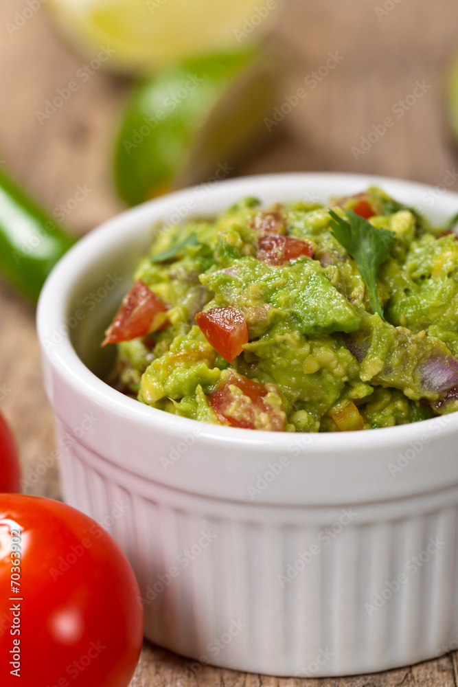 Guacamole with avocado, lime, tomato and cilantro Guacamole with avocado, lime, tomato and cilantro