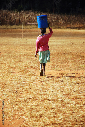 The water bearer - Pomerini - Tanzania - Africa