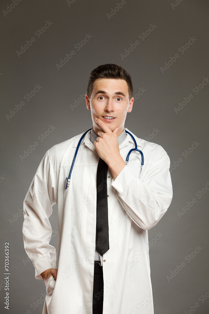 Surprised doctor with a copy space above him Surprised doctor with a copy space above him