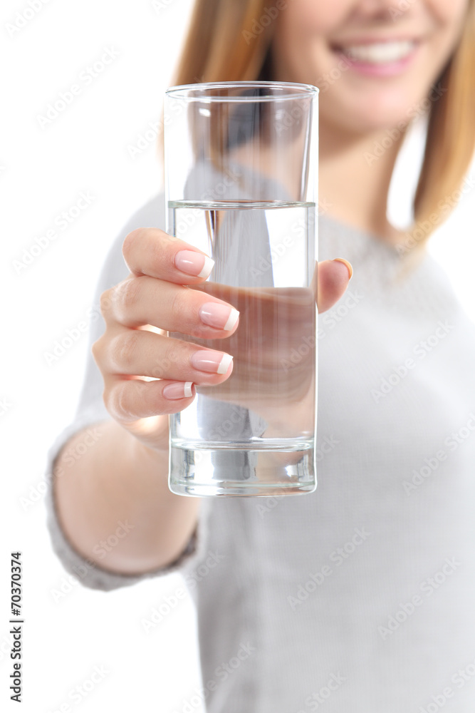 Happy woman hand holding a fresh glass of water Happy woman hand holding a fresh glass of water