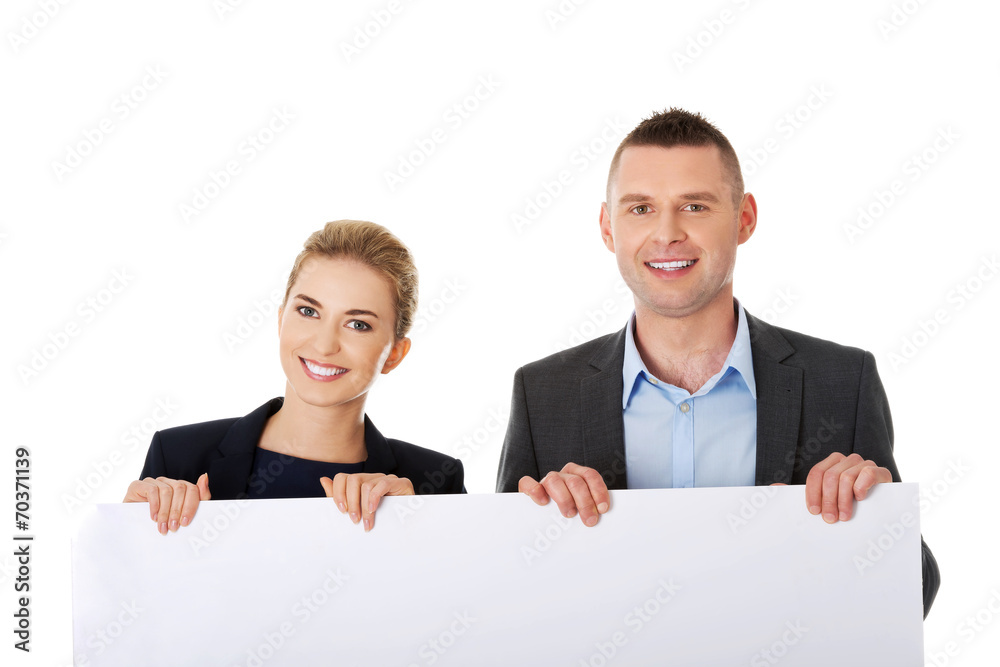 Business team with a banner Business team with a banner