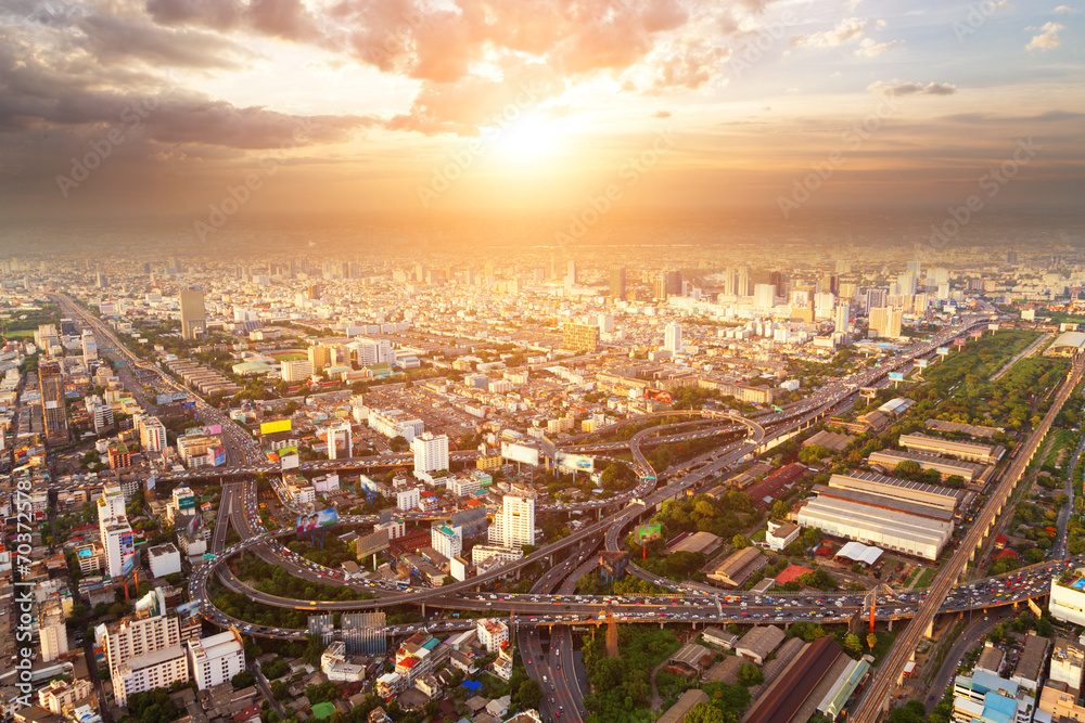 Fototapeta premium bird view of urban cityscape at sunset