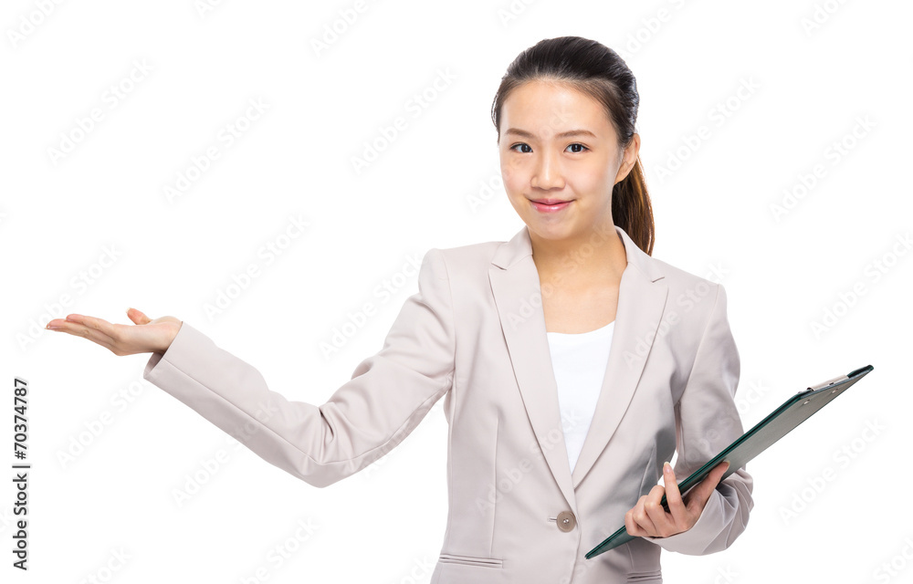 Young businesswoman with clipboard and hand present Young businesswoman with clipboard and hand present