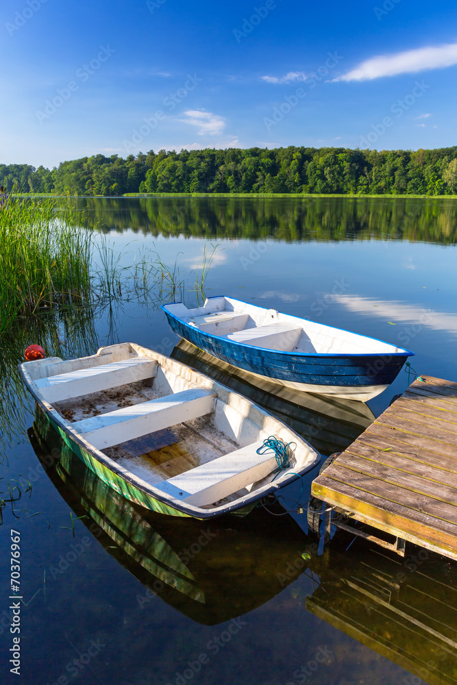 Fishing boats on the masurian lake in Poland Fishing boats on the masurian lake in Poland