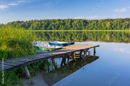 Fototapeta Naklejka Na Ścianę i Meble -  Fishing boats on the masurian lake in Poland