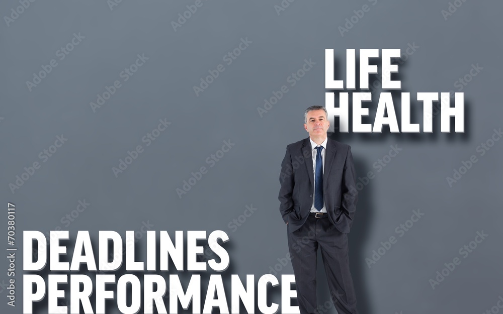 Composite image of mature businessman looking at camera