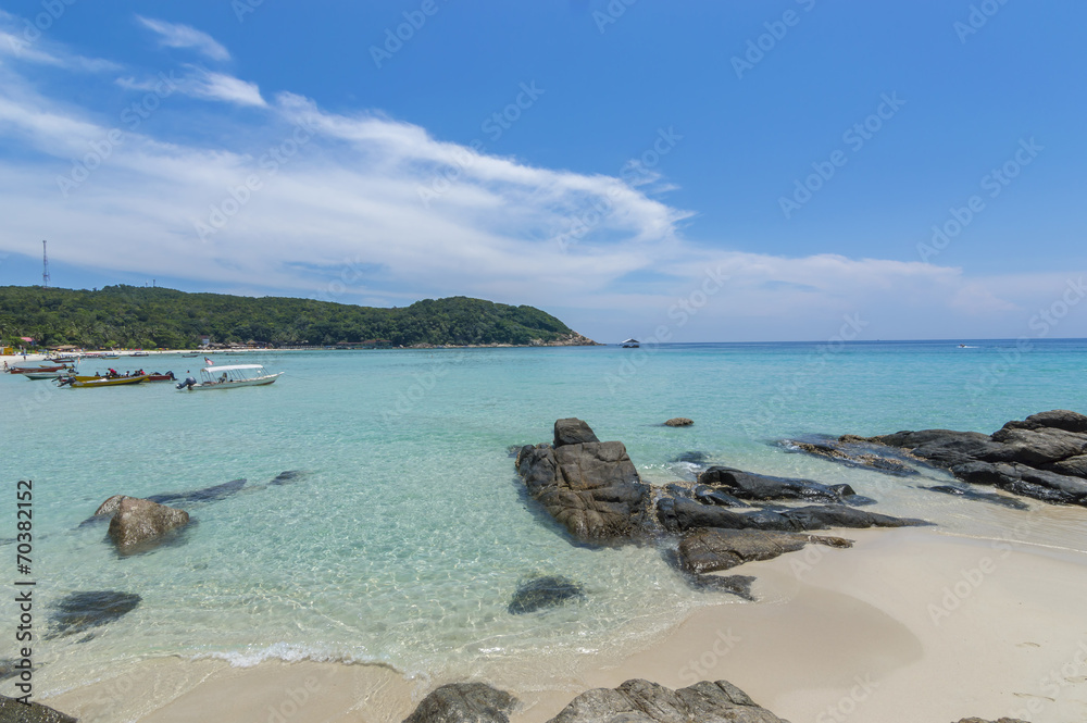 Beach with clear water and blue skies