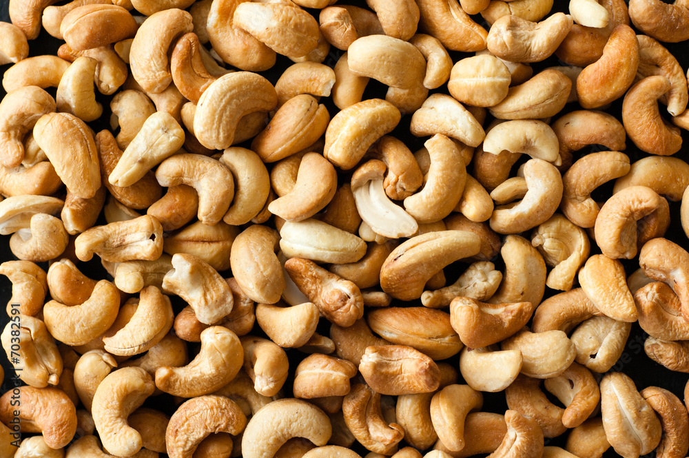 cashew nuts on black backround cashew nuts on black backround