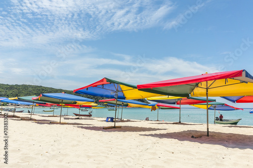 Tropical beach with shade umbrella